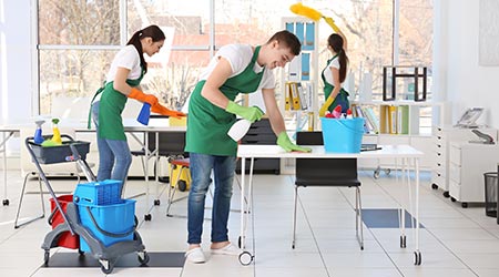Professional cleaning team working