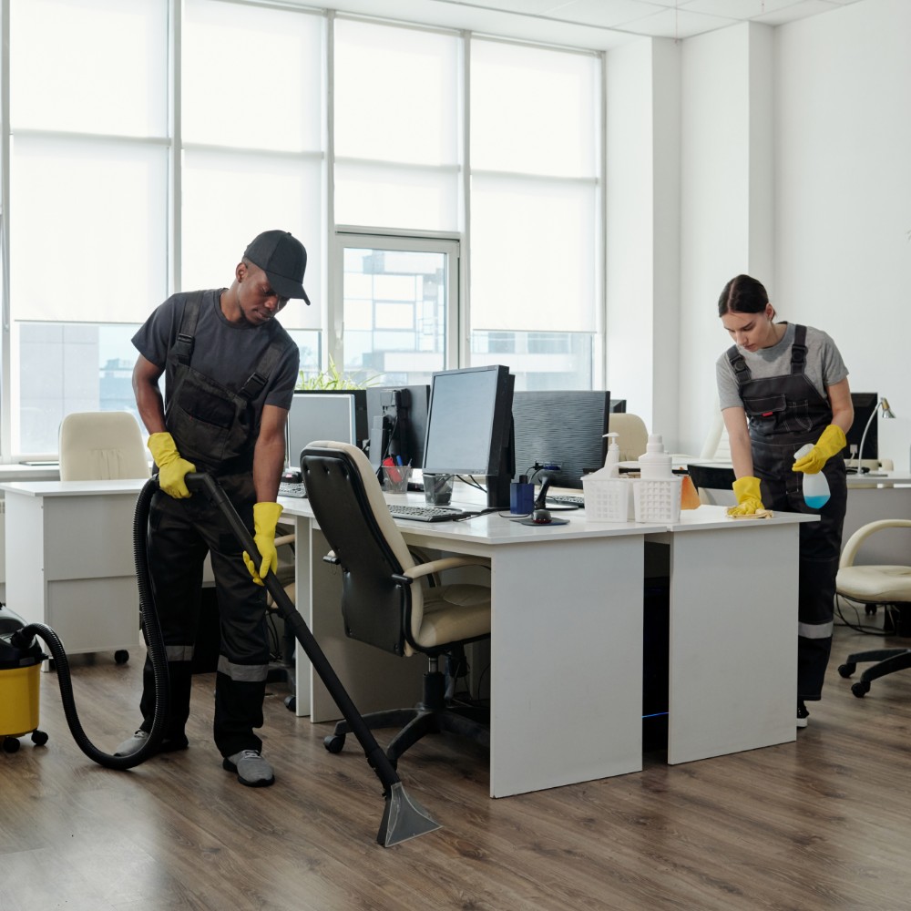 Professional team cleaning office